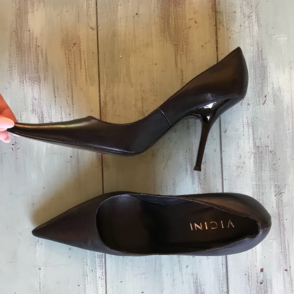 Black leather pointed toe heels